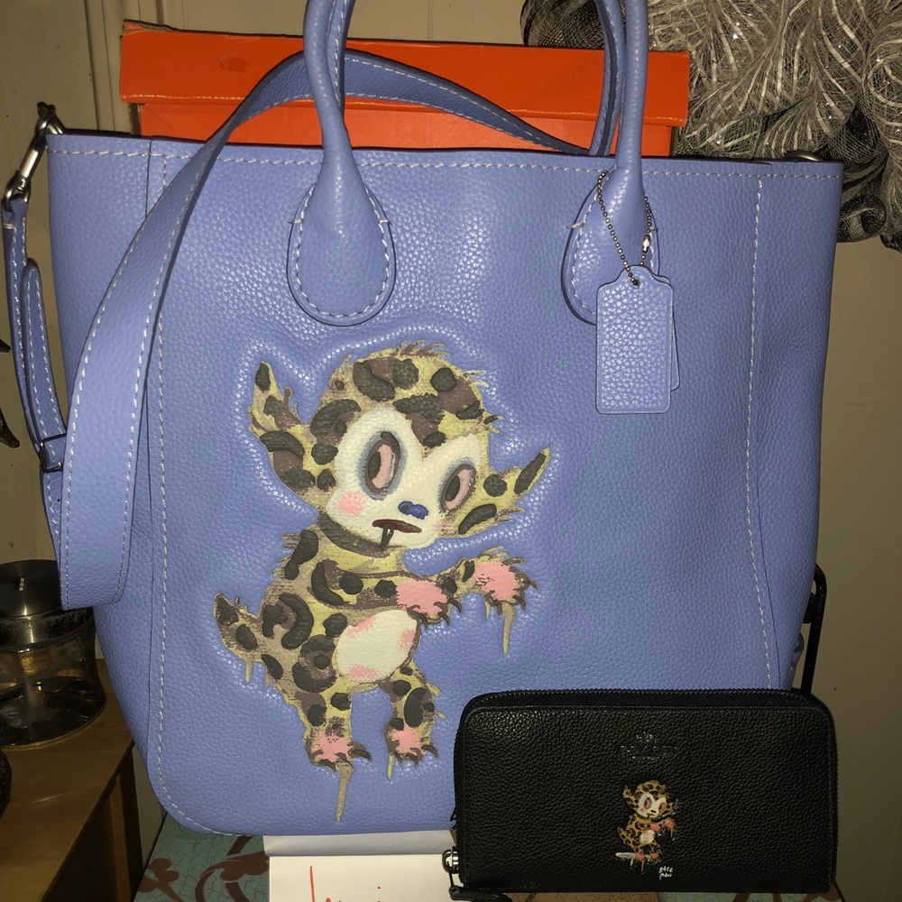 TRADED Baseman Buster Le Fauve Tatum w/wallet